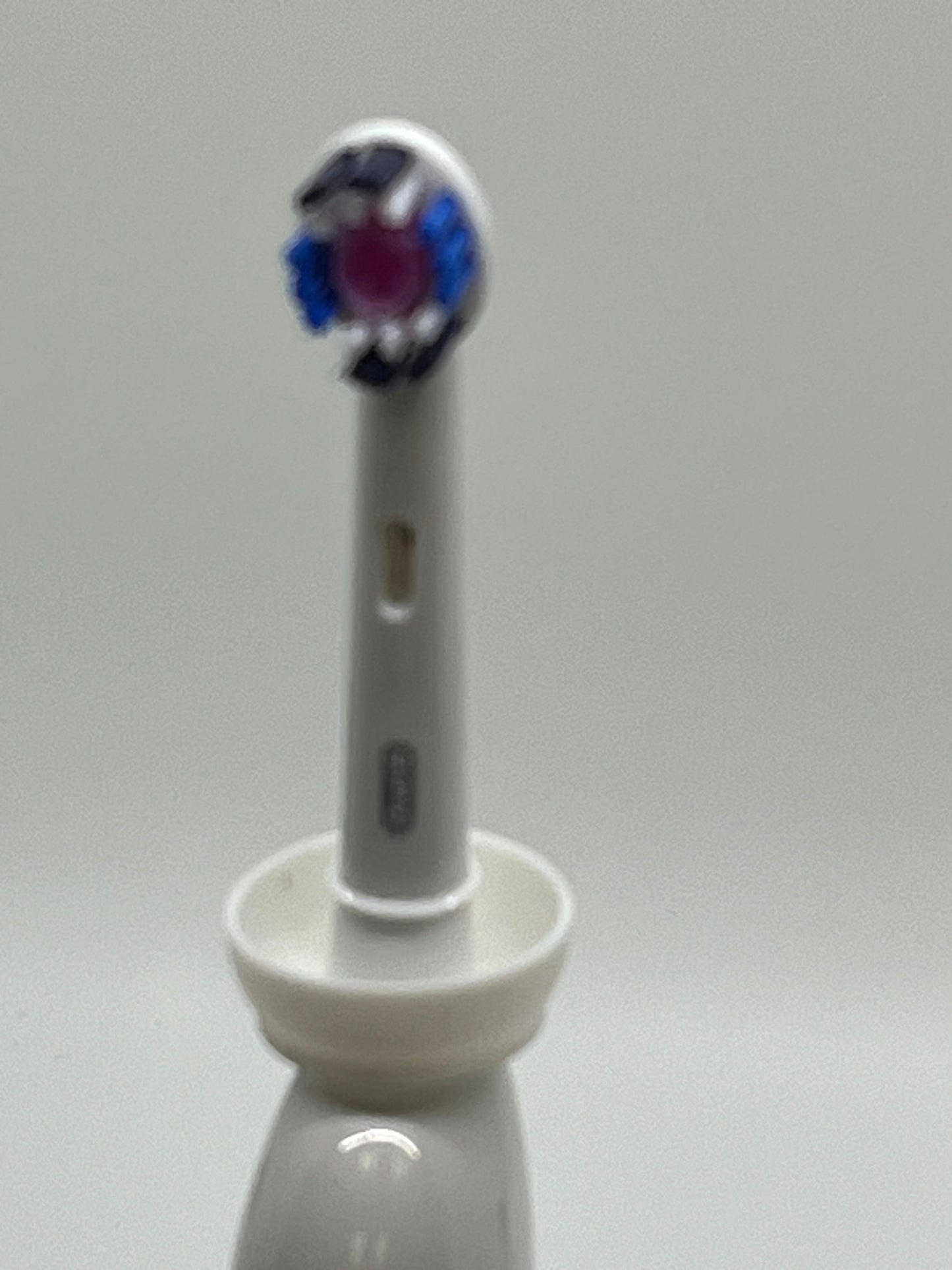 The Drip Dodger by Koettco International. No More Mess!! Keep hands and base of electric toothbrushes clean of residues (Paste, Slop, Drips, Spit, Muck, Yuck.) Black and White.